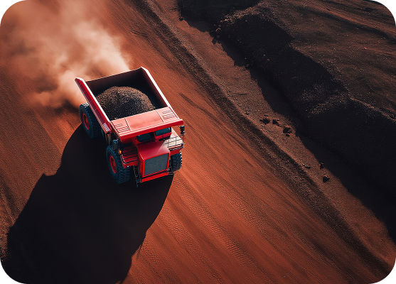 Haul truck transporting material at an open-pit mining site.